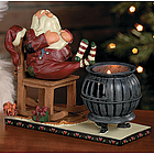 Santa Warming His Feet Tealight Holder
